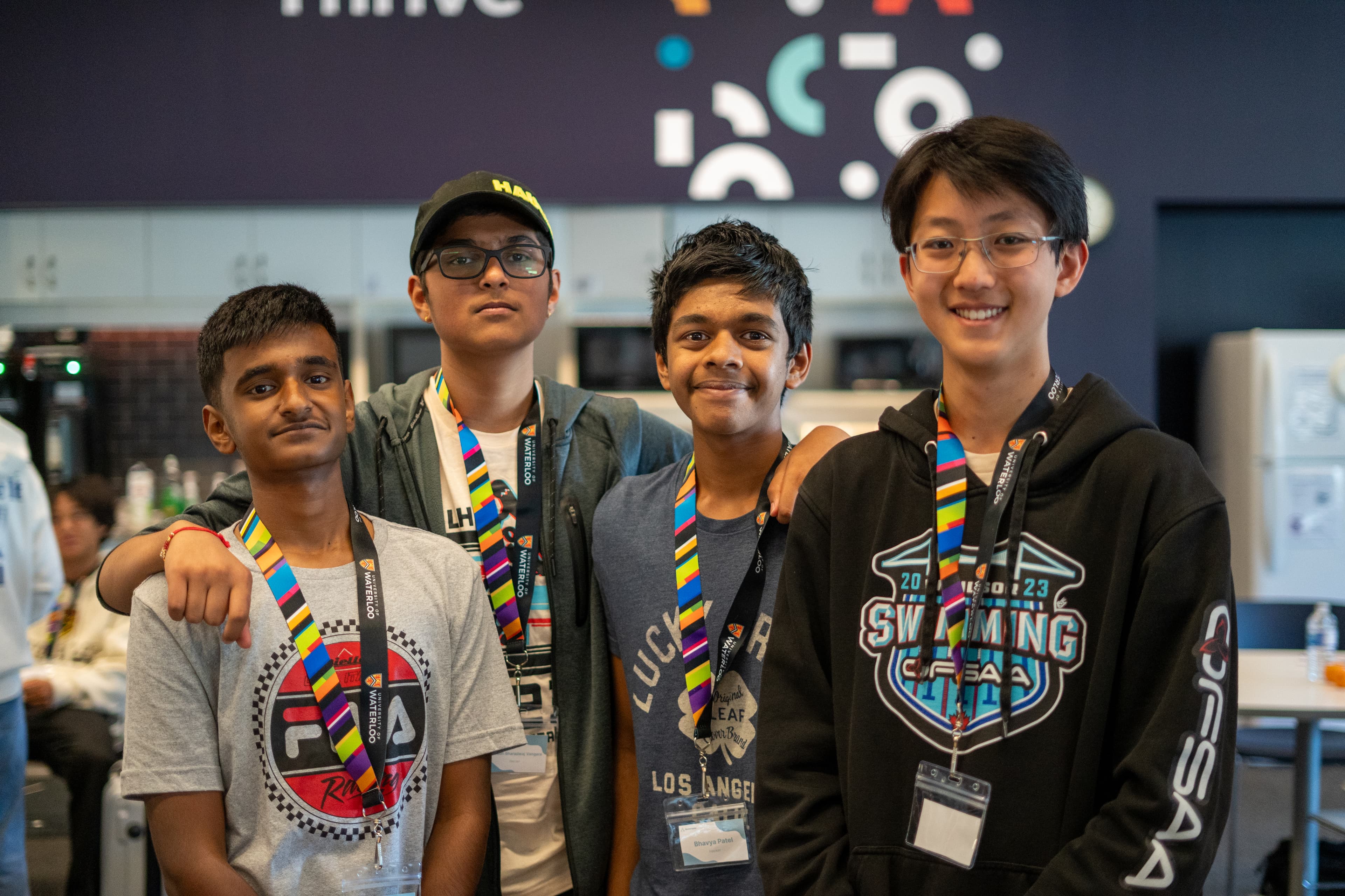 Participants collaborating at RythmHacks