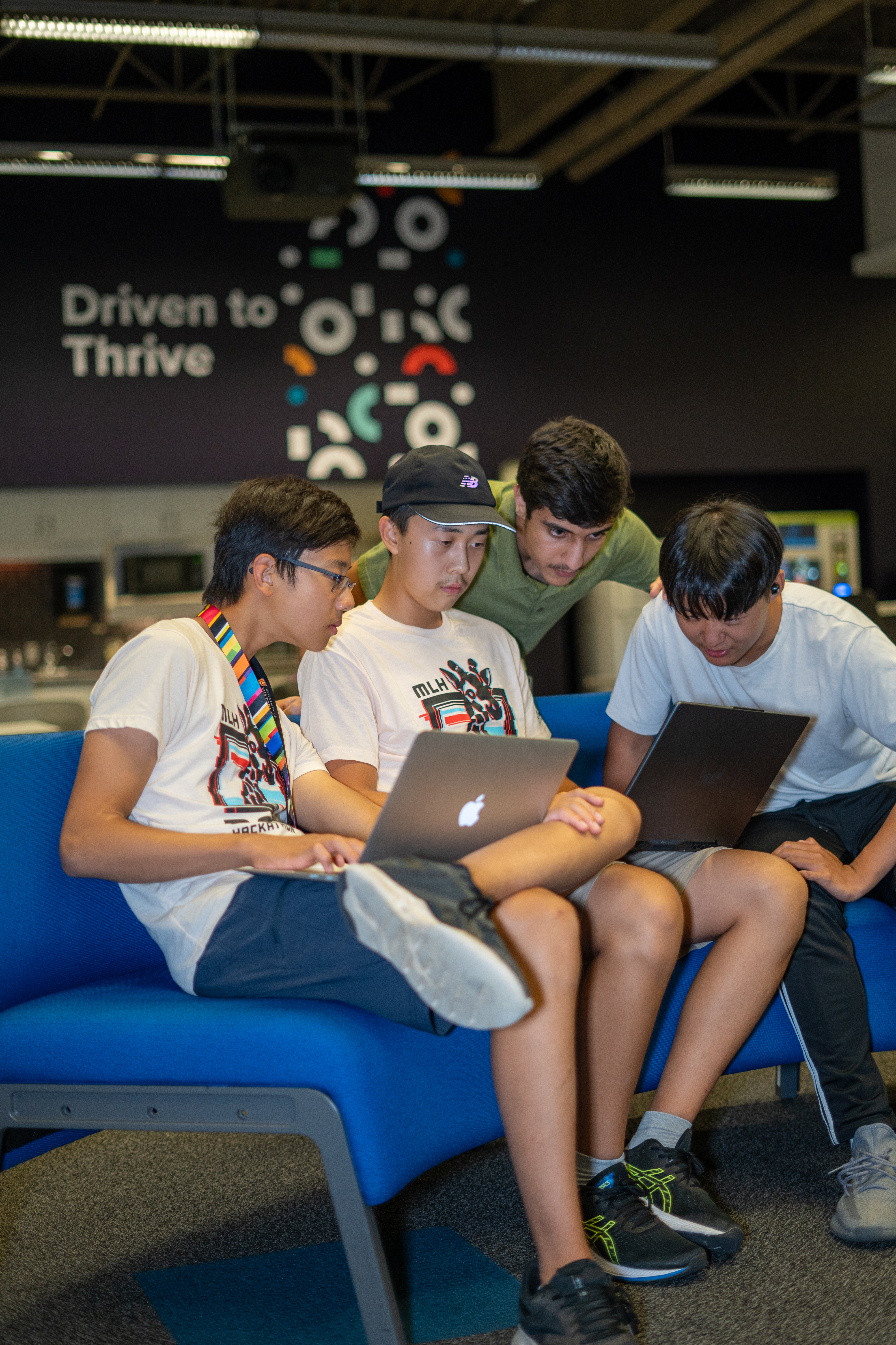 RythmHacks participants holding awards