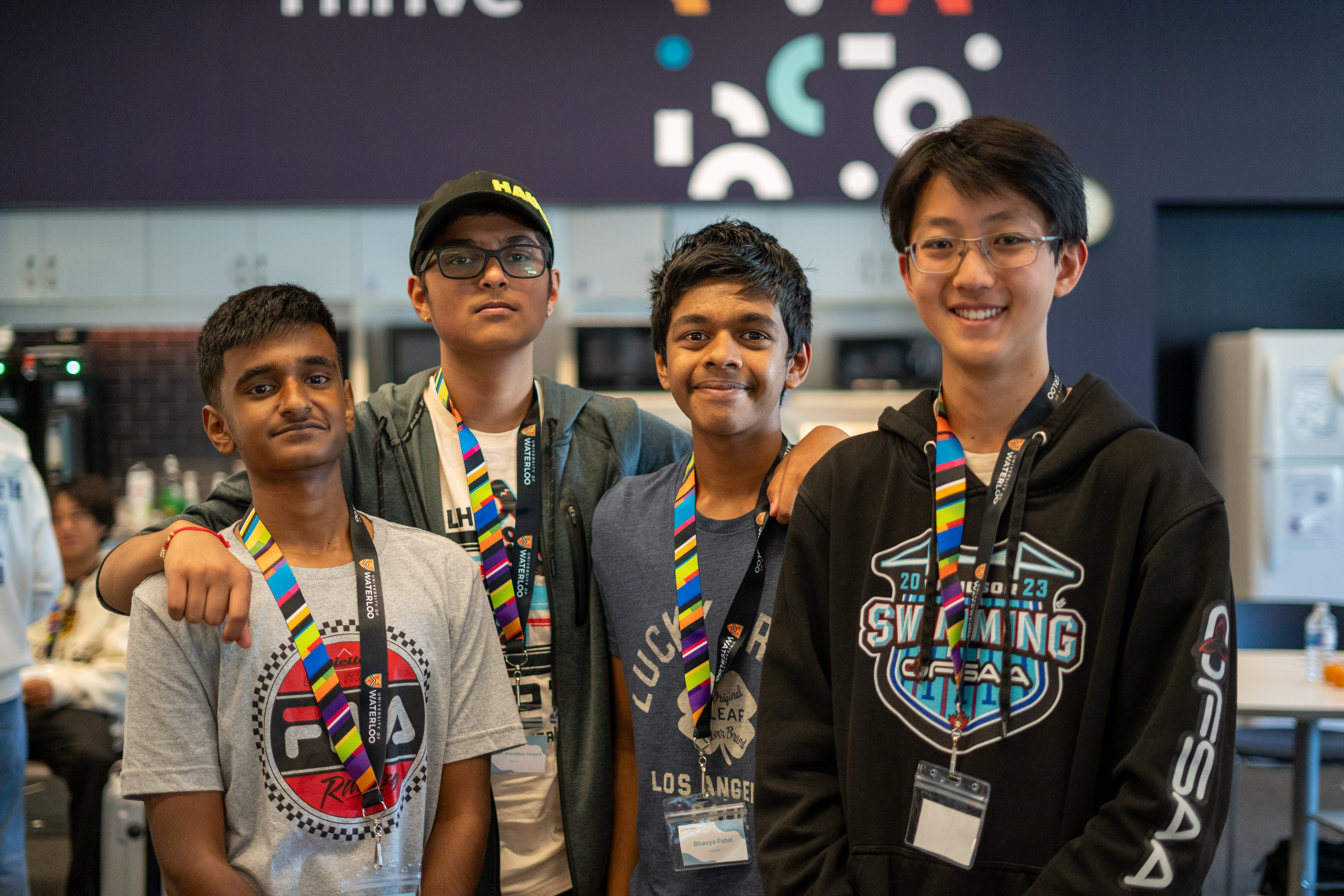 Participants collaborating at RythmHacks